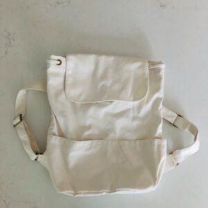 NEW Canvas Backpack with Drawstring and Flap Closure, Laude the Label